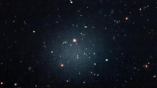 The galaxy named NGC 1052-DF2, a large fuzzy-looking galaxy so diffused that astronomers call it a 'see-through' galaxy because its missing most, if not all of its dark matter, is shown in this photo obtained from NASA on March 28, 2018.(Reuters Photo)