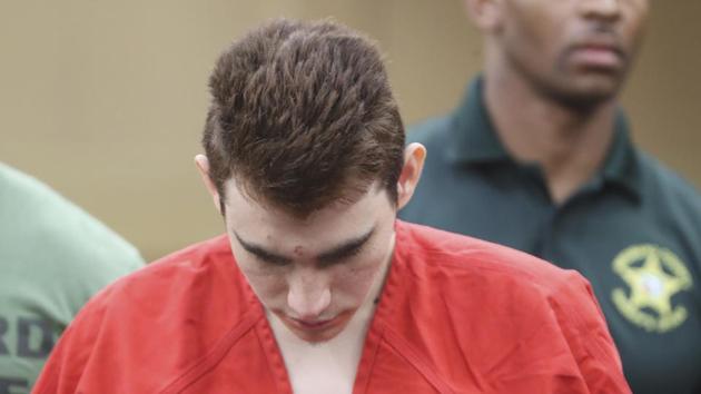 Florida school shooting suspect Nikolas Cruz is lead out of the courtroom after an arraignment hearing at the Broward County Courthouse in Fort Lauderdale on March 14., (AP File Photo) Florida school shooting suspect Nikolas Cruz is lead out of the courtroom after an arraignment hearing at the Broward County Courthouse in Fort Lauderdale on March 14., (AP File Photo)