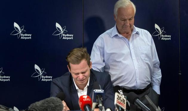 Former Australian cricket captain Steve Smith, left, speaks to the media while being supported by his father, Peter, in Sydney, Thursday, March 29, 2018, after being sent home from South Africa following a ball tampering scandal. (AP) Former Australian cricket captain Steve Smith, left, speaks to the media while being supported by his father, Peter, in Sydney, Thursday, March 29, 2018, after being sent home from South Africa following a ball tampering scandal. (AP)