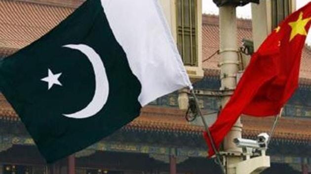 A Pakistan national flag flies alongside a Chinese national flag in front of the portrait of Chairman Mao Zedong on Beijing's Tiananmen Square on May 18, 2011. (Reuters file Photo) A Pakistan national flag flies alongside a Chinese national flag in front of the portrait of Chairman Mao Zedong on Beijing's Tiananmen Square on May 18, 2011. (Reuters file Photo)