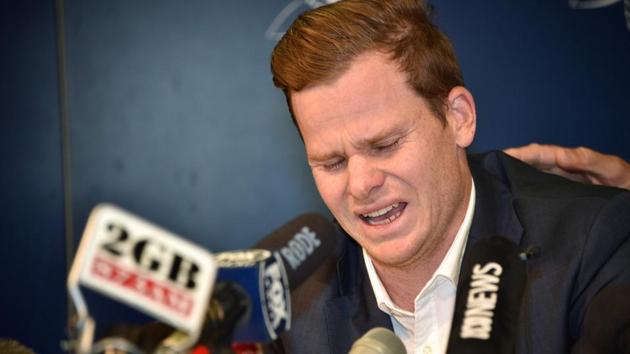 Steve Smith reacts at a press conference at the airport in Sydney on March 29, 2018, after returning from South Africa. Distraught Australian cricketer Smith accepted full responsibility for a ball-tampering scandal that has shaken the sport, saying he was devastated by his ‘big mistake’.(AFP)