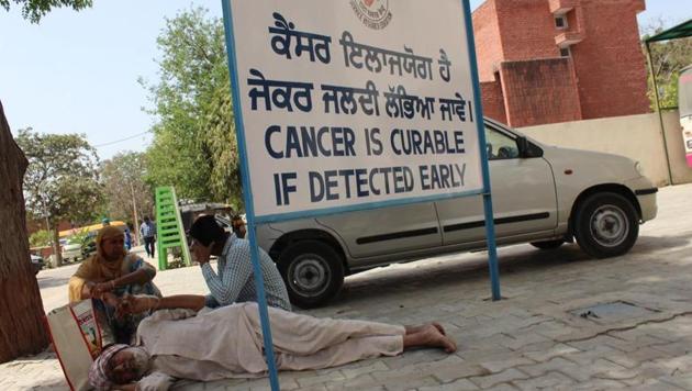 Patients and their relatives awaiting their turn outside the Homi Bhabha Cancer Hospital in Sangrur. Of 22 districts, only Moga, Bathinda and Fazilka have kept a record of the number of deaths.(HT File)