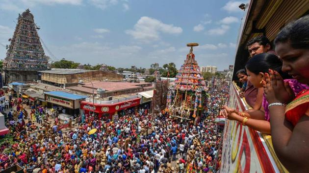 Devotees pull the chariot of Lord Shiva during the annual Panguni celebrations of the Mylapore Sri Kapaleeswarar Temple in Chennai, Tamil Nadu. (PTI) Devotees pull the chariot of Lord Shiva during the annual Panguni celebrations of the Mylapore Sri Kapaleeswarar Temple in Chennai, Tamil Nadu. (PTI)