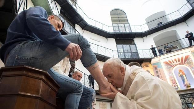 Pope Francis kisses the foot of an inmate at the Regina Coeli prison during the Holy Thursday celebration in Rome, Italy in a ritual that recreates the events of the Last Supper and Jesus washing his disciples’ feet. (Osservatore Romano / REUTERS) Pope Francis kisses the foot of an inmate at the Regina Coeli prison during the Holy Thursday celebration in Rome, Italy in a ritual that recreates the events of the Last Supper and Jesus washing his disciples’ feet. (Osservatore Romano / REUTERS)