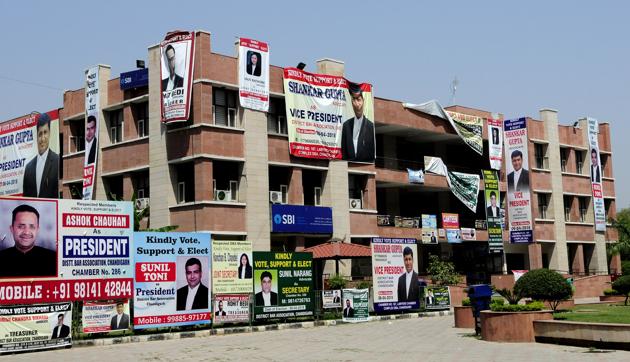 Candidates in the fray for different posts of the Bar have put up posters at the district courts complex in Chandigarh on Friday.(Keshav Singh/HT)