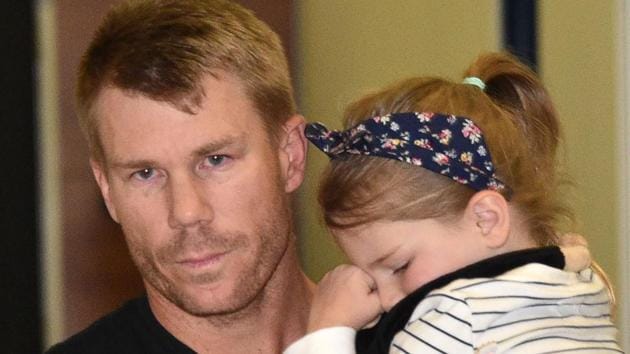 David Warner arrived in Sydney on Thursday after Cricket Australia handed him a one-year ban for his role in the ball-tampering scandal.(AFP)