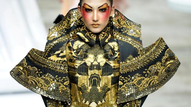 A model presents a creation for a make-up styling show by Mao Geping at China Fashion Week in Beijing, China. (Jason Lee / REUTERS)
