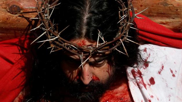 An actor, portraying Jesus Christ, takes part in the interactive street theatre Passion play "Il-Mixja" (The Way), one of a series of Holy Week activities in the run-up to Easter, in the grounds of Mount Carmel Mental Hospital in Attard, Malta. (Darrin Zammit Lupi / REUTERS) An actor, portraying Jesus Christ, takes part in the interactive street theatre Passion play "Il-Mixja" (The Way), one of a series of Holy Week activities in the run-up to Easter, in the grounds of Mount Carmel Mental Hospital in Attard, Malta. (Darrin Zammit Lupi / REUTERS)