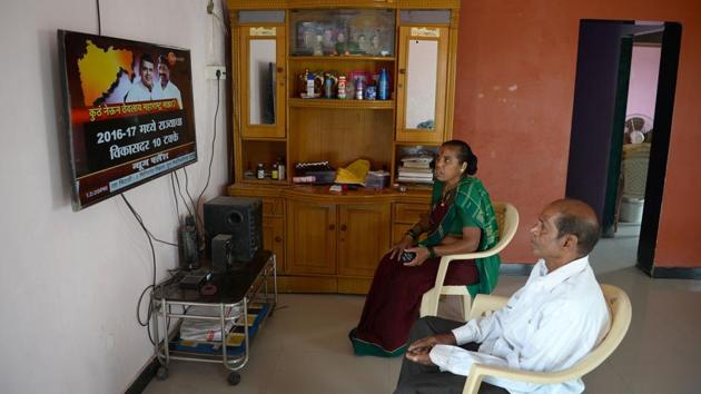 Deepa Bhoir would sit in darkness outside her island home and stare at Mumbai glowing in the distance. Now she stays up late watching soap operas. Bhoir and her husband Sasuram are among hundreds of villagers on the UNESCO world heritage-listed island to have had mains electricity installed in their houses for the first time. (Punit Paranjpe / AFP) Deepa Bhoir would sit in darkness outside her island home and stare at Mumbai glowing in the distance. Now she stays up late watching soap operas. Bhoir and her husband Sasuram are among hundreds of villagers on the UNESCO world heritage-listed island to have had mains electricity installed in their houses for the first time. (Punit Paranjpe / AFP)