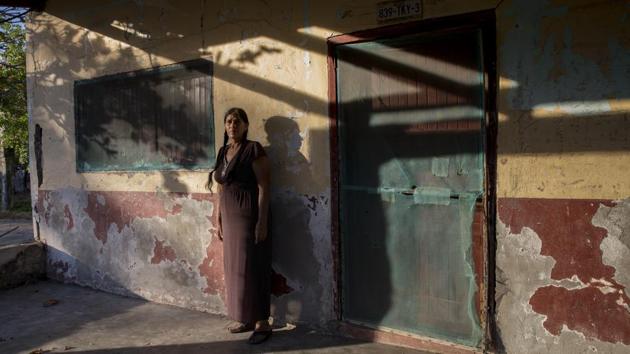 In the tattered town of Cachimbo, Mexico, population 150, people lived with few roads, infrequent rain and candles or kerosene lamps as the only source of light. But life changed after Norma Guerra and three other local women went to the Barefoot College in Tilonia, Rajasthan returning as ‘Solar Mamas’. Since then they’ve installed dozens of solar panels, batteries and wiring that now run lights all over Cachimbo. (Yael Martinez / Bloomberg)