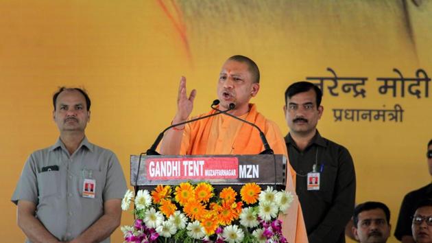 Uttar Pradesh Chief Minister Yogi Adityanath addresses a gathering at Kavi Nagar Ramlila ground in Ghaziabad on Friday. Adityanath inaugurated the longest elevated road in the country in Ghaziabad. The six-lane road is approximately 10 kilometres-long, built on 227 single pillars and connects UP Gate to Rajnagar Extension. (PTI)