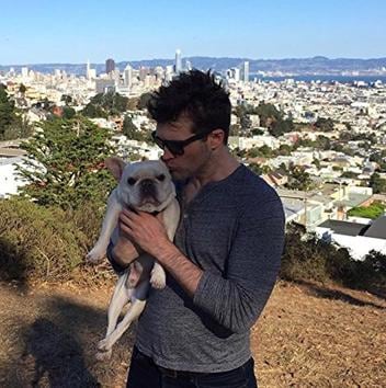 Daniel Mallory loves dogs and while he doesn’t own one, he volunteers at a dog shelter(Photo courtesy: Harper Collins India)