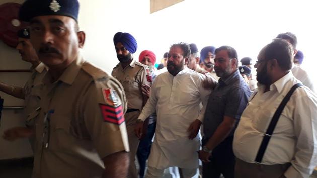 Congress councillor Devinder Singh Babla being taken to the district courts in Chandigarh on Saturday. (Sikander Singh/HT) Congress councillor Devinder Singh Babla being taken to the district courts in Chandigarh on Saturday. (Sikander Singh/HT)