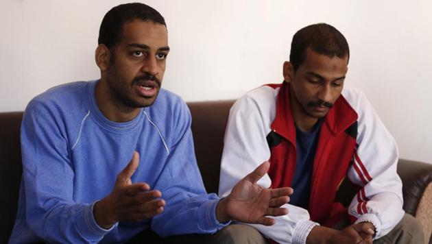 Alexanda Amon Kotey (left) and El Shafee Elsheikh, who were allegedly among four British jihadis who made up a brutal Islamic State cell dubbed ‘The Beatles’, speak during an interview with The Associated Press at a security center in Kobani, Syria, on March 30, 2018.(AP) Alexanda Amon Kotey (left) and El Shafee Elsheikh, who were allegedly among four British jihadis who made up a brutal Islamic State cell dubbed ‘The Beatles’, speak during an interview with The Associated Press at a security center in Kobani, Syria, on March 30, 2018.(AP)