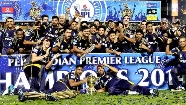 Kolkata Knight Riders players celebrate with the trophy after their victory against Kings XI Punjab in the IPL 2014 final. (IPL) 