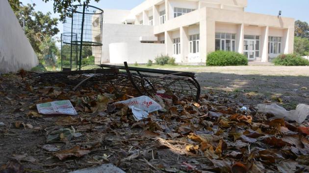 The lawn at the community centre, Sector 12A, with leaves, garbage scattered around.(Sant Arora/HT)