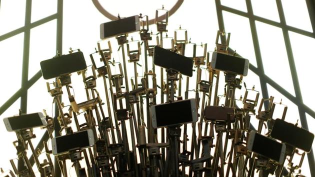 A throne made of selfie sticks, perhaps to the reign of selfie stardom in pop culture or as pop culture itself. (Mario Anzuoni / REUTERS) A throne made of selfie sticks, perhaps to the reign of selfie stardom in pop culture or as pop culture itself. (Mario Anzuoni / REUTERS)