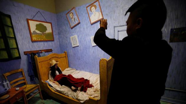Guests seen in a Van Gogh inspired bedroom. The museum avoids the surface value of selfies and is more about the phenomenon itself and how universally embraced it is by the human race. (Mario Anzuoni / REUTERS) Guests seen in a Van Gogh inspired bedroom. The museum avoids the surface value of selfies and is more about the phenomenon itself and how universally embraced it is by the human race. (Mario Anzuoni / REUTERS)