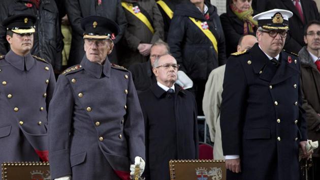 In this Monday, Nov. 11, 2013 file photo, Belgium's Prince Laurent, front right, and Britain's Prince Philip, front left, participate in a special Armistice Day ceremony under the Menin Gate in Ypres, Belgium. The Belgian parliament has withdrawn part of the endowment of the ever-controversial Prince Laurent after he showed up at a Chinese diplomatic function in military uniform without the consent of the government. (AP Photo) In this Monday, Nov. 11, 2013 file photo, Belgium's Prince Laurent, front right, and Britain's Prince Philip, front left, participate in a special Armistice Day ceremony under the Menin Gate in Ypres, Belgium. The Belgian parliament has withdrawn part of the endowment of the ever-controversial Prince Laurent after he showed up at a Chinese diplomatic function in military uniform without the consent of the government. (AP Photo)