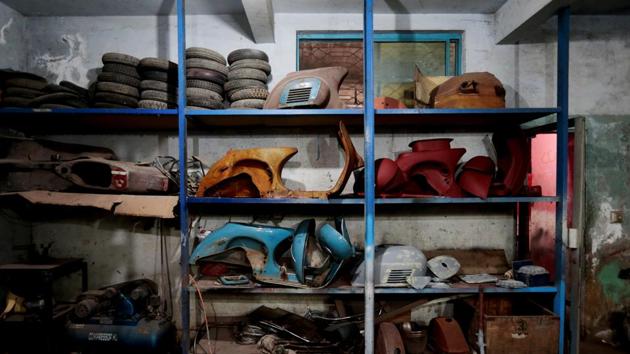 Disassembled Vespa scooters rest on shelves in different states of restoration, at a restoration and repair workshop in Islamabad. In the leafy capital, once the summer heat wanes, apart from ardent fans driven by nostalgia, a handful of Western diplomats can also be seen buzzing around on their pastel-coloured Vespas. (Caren Firouz / REUTERS) Disassembled Vespa scooters rest on shelves in different states of restoration, at a restoration and repair workshop in Islamabad. In the leafy capital, once the summer heat wanes, apart from ardent fans driven by nostalgia, a handful of Western diplomats can also be seen buzzing around on their pastel-coloured Vespas. (Caren Firouz / REUTERS)