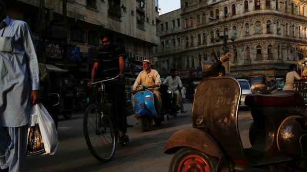 A man rides a Vespa scooter on a busy street, in a low-income neighbourhood in Karachi. Many long-term owners find that possessing a Vespa in Pakistan is a labour of love, with original spare parts scant and only a handful of mechanics skilled enough to restore the originals. (Akhtar Soomro / REUTERS) A man rides a Vespa scooter on a busy street, in a low-income neighbourhood in Karachi. Many long-term owners find that possessing a Vespa in Pakistan is a labour of love, with original spare parts scant and only a handful of mechanics skilled enough to restore the originals. (Akhtar Soomro / REUTERS)