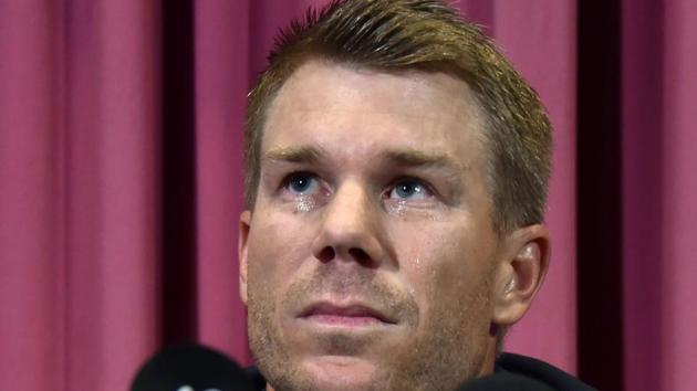 Australian cricketer David Warner listens to a question at a press conference at the Sydney Cricket Ground (SCG) in Sydney on Saturday, after returning from South Africa.(AFP)