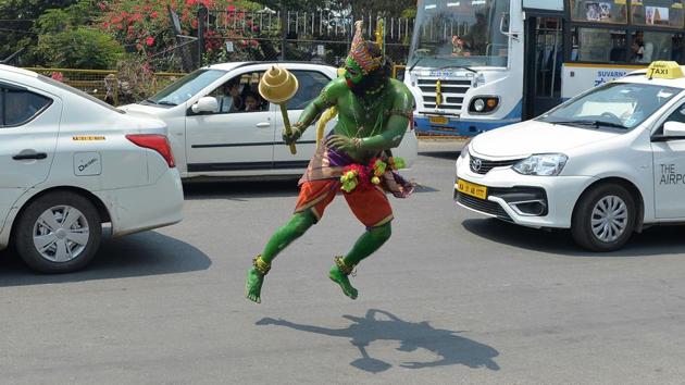 An artist dressed as Hanuman dances in the street on the occasion of Ram Navami in Bangalore, Karnartaka. (Manjunath Kiran / AFP) An artist dressed as Hanuman dances in the street on the occasion of Ram Navami in Bangalore, Karnartaka. (Manjunath Kiran / AFP)