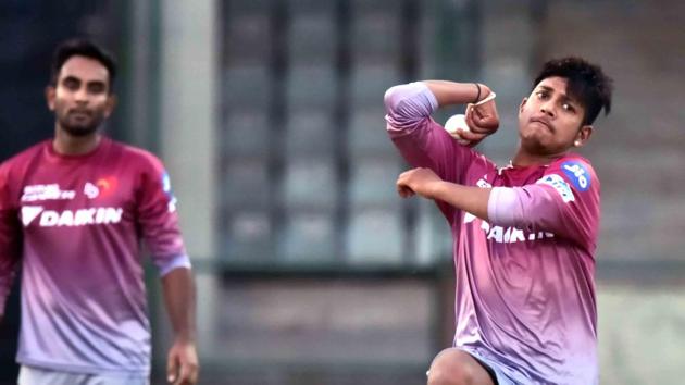 Nepal spinner Sandeep Lamichhane (R) bowls during a practice session in Delhi. (HT Photo)