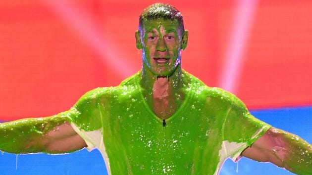 John Cena gets slimed onstage at Nickelodeon's 2018 Kids' Choice Awards at The Forum.(AFP)