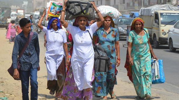 Rajasthani pilgrims in Haridwar on Sunday.(HT Photo)