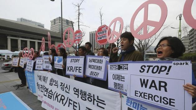 Protesters stage a rally to denounce the annual joint military exercises between South Korea and the United States near the US Embassy in Seoul, South Korea, April 1.(AP Photo) Protesters stage a rally to denounce the annual joint military exercises between South Korea and the United States near the US Embassy in Seoul, South Korea, April 1.(AP Photo)