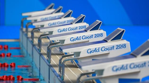 Swimming starting blocks with "Gold Coast 2018 "signage are seen at the Optus Aquatic centre. (AFP)