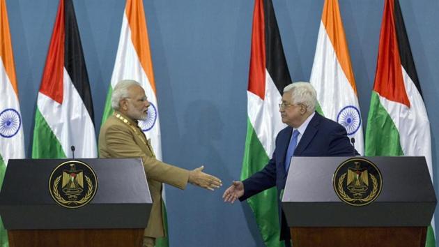 Prime Minister Narendra Modi shakes hands with Palestinian President Mahmoud Abbas following a joint statement at the end of their meeting at the Palestinian Authority headquarters in the West Bank city of Ramallah on February 10.(AP File Photo)