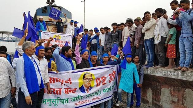 Protesters stopped a train at Forbesganj junction in Bihar. With posters, banners and flags, supporters of the Bhim Army and other Dalit organisations, halted over a dozen long-distance trains, stranding passengers. At some places in Bihar, protesters also blocked national and state highways. (ANI)