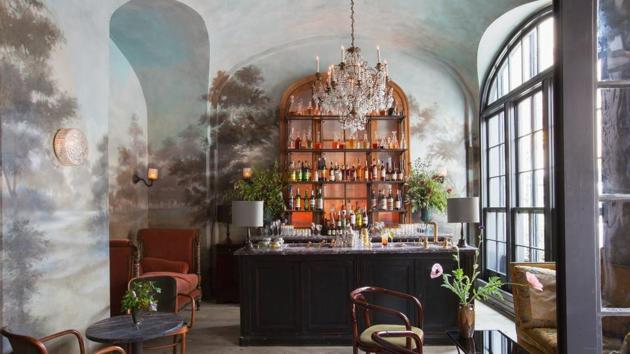 Interiors of Le Coucou, which re-introduced New York to fine dining, with grand chandeliers, enough candles to light up a medieval palace, and a kitchen awash in copper. (Facebook) Interiors of Le Coucou, which re-introduced New York to fine dining, with grand chandeliers, enough candles to light up a medieval palace, and a kitchen awash in copper. (Facebook)