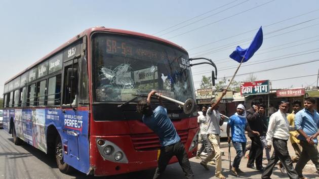 Members of a Dalit organisation during Bharat Bandh in Bhopal on Monday.(Mujeeb Faruqui/HT Photo)