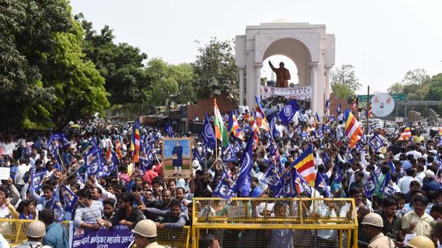 Members of the Dalit community and allied organisations shout slogans during a countrywide strike against the Supreme Court’s order which allegedly diluting the Scheduled Castes and Scheduled Tribes (Prevention of Atrocities) Act 1989, in Hazratganj, Lucknow. (Subhankar Chakraborty / HT Photo) Members of the Dalit community and allied organisations shout slogans during a countrywide strike against the Supreme Court’s order which allegedly diluting the Scheduled Castes and Scheduled Tribes (Prevention of Atrocities) Act 1989, in Hazratganj, Lucknow. (Subhankar Chakraborty / HT Photo)
