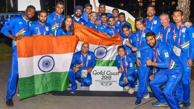 Indian contingent with officials during the flag-hoisting ceremony at the Commonwealth Games 2018 games village in Gold Coast, Australia, on Monday. (PTI)