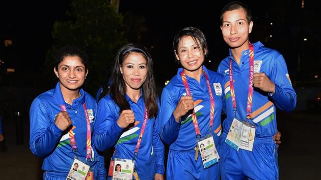Indian boxing contingent (L-R) Pinki Rani Jangra, Mary Kom, Sarita Devi Laishram and Lovlina Borgohain during the country's flag-hoisting ceremony. (PTI) Indian boxing contingent (L-R) Pinki Rani Jangra, Mary Kom, Sarita Devi Laishram and Lovlina Borgohain during the country's flag-hoisting ceremony. (PTI)