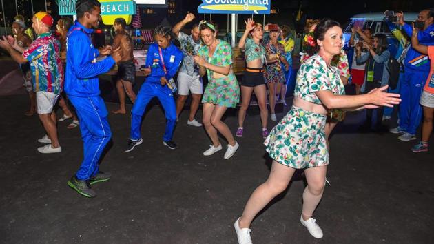 Indian athletes with Australian artists at the Commonwealth Games village. (PTI) Indian athletes with Australian artists at the Commonwealth Games village. (PTI)