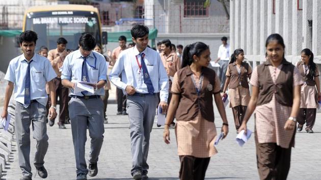 Students of Class 12 after appearing in CBSE examinations in Noida on March 13.(Sunil Ghosh / HT file)