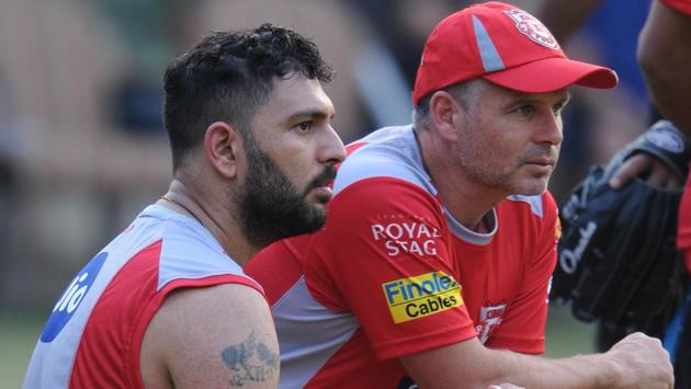 Yuvraj Singh (L) watches on alongside Brad Hodge as teammates prepare at the nets. (Ravi Kumar/HT Photo) Yuvraj Singh (L) watches on alongside Brad Hodge as teammates prepare at the nets. (Ravi Kumar/HT Photo)