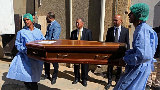 A casket holding one of 38 Indians abducted by the Islamic State group in 2014, that were found in a mass grave outside Mosul is loaded on a truck to be transported from Baghdad’s main morgue to the Baghdad airport in Iraq. The mortal remains of the 38 Indian men arrived in Punjab’s Amritsar on Monday afternoon on a special aircraft of the Indian Air Force. (Khalid Mohammed / AP) A casket holding one of 38 Indians abducted by the Islamic State group in 2014, that were found in a mass grave outside Mosul is loaded on a truck to be transported from Baghdad’s main morgue to the Baghdad airport in Iraq. The mortal remains of the 38 Indian men arrived in Punjab’s Amritsar on Monday afternoon on a special aircraft of the Indian Air Force. (Khalid Mohammed / AP)