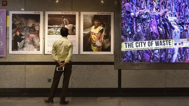 Art in the Metro at Mandi House, which has an average daily footfall of about 1.9 lakh, seems to be a hit with commuters-- one can find people stopping by and poring over exhibits throughout the day. (Raj K Raj / HT Photo) Art in the Metro at Mandi House, which has an average daily footfall of about 1.9 lakh, seems to be a hit with commuters-- one can find people stopping by and poring over exhibits throughout the day. (Raj K Raj / HT Photo)