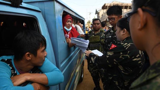 The stunned and tearful residents, who once lived in the main battle zone, had not been allowed home until now due to fears of unexploded bombs still buried in the ruins. Authorities finally relented as rebuilding plans are moving forward, which will likely result in many of the worst-hit areas being razed. (Ted Aljibe / AFP)
