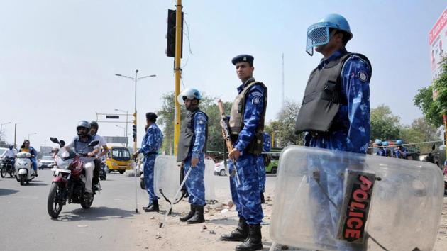 Rapid Action Force personnel stand guard in wake of Bharat Bandh in Amritsar on Sunday.(PTI Photo) Rapid Action Force personnel stand guard in wake of Bharat Bandh in Amritsar on Sunday.(PTI Photo)