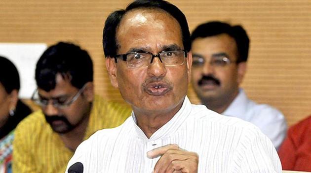 Political experts says the three-time chief minister, Shivraj Singh Chouhan, is trying to keep these voters happy with doles such as patta, or land lease right, to the SC/ST for government plots they are occupying.(HT File Photo) Political experts says the three-time chief minister, Shivraj Singh Chouhan, is trying to keep these voters happy with doles such as patta, or land lease right, to the SC/ST for government plots they are occupying.(HT File Photo)