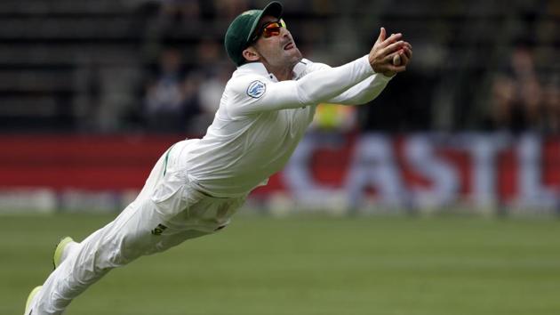 Dean Elgar took a brilliant catch of Tim Paine to dismiss him for 62 and bowl Australia out for 221 in the Johannesburg Test.(AP)