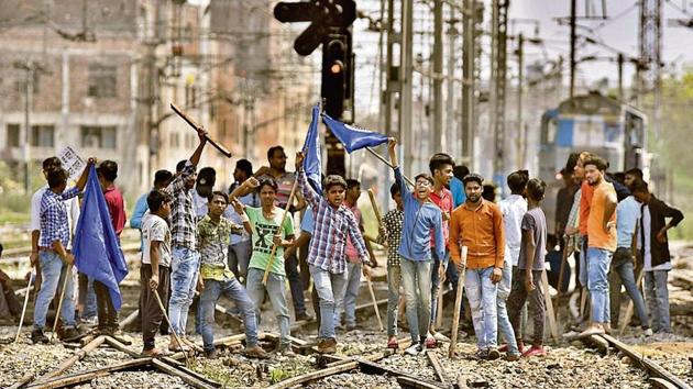 Demonstrators blocking trains at the Ludhiana railway station during the Bharat Bandh by Dalit outfits on Monday.(Gurpreet Singh/HT) Demonstrators blocking trains at the Ludhiana railway station during the Bharat Bandh by Dalit outfits on Monday.(Gurpreet Singh/HT)