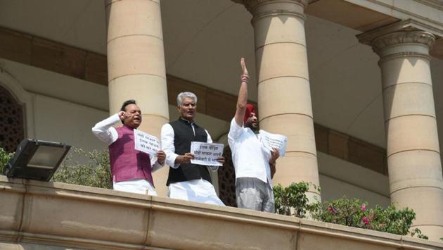 The announcement comes after Congress MPs from Punjab staged a protest in Parliament on Tuesday, demanding compensation for the workers killed in Iraq. (Arvind Yadav / HT Photo)